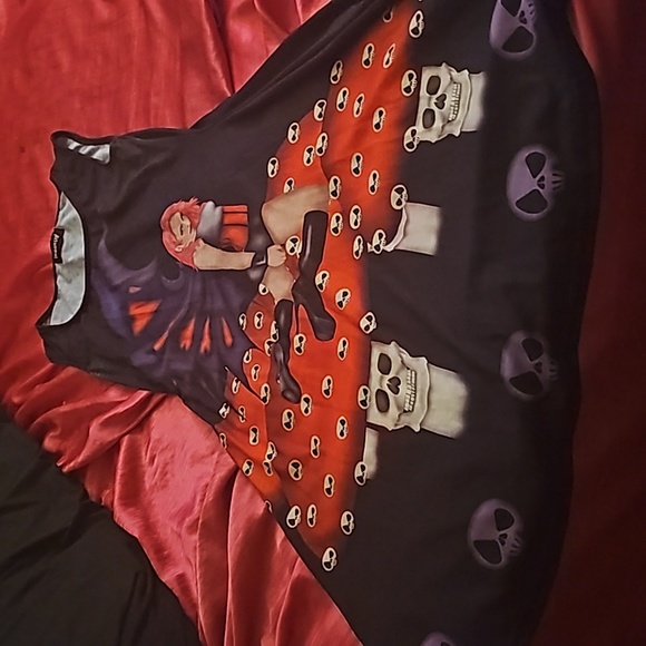 Never worn dress with different colored skulls and patterns. - Picture 1 of 3